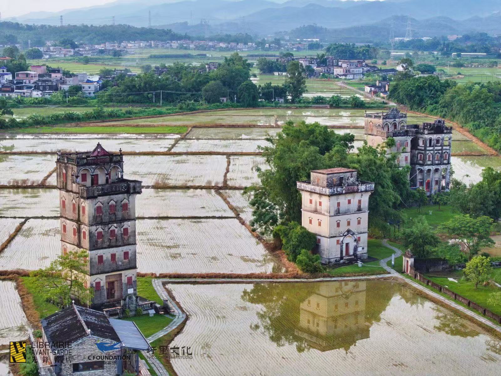 Kaiping diaolou among fields and village buildings