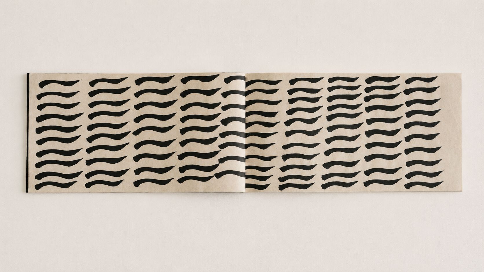 Interior spread showing repeated calligraphic marks.