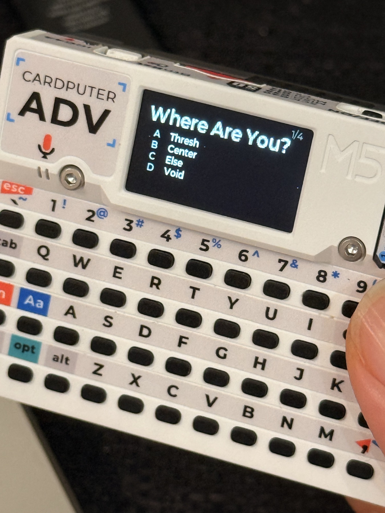 Close view of a randomly selected question on the M5Stack screen