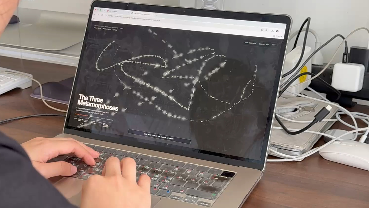 Close view of hand input and the responsive visual trace on screen